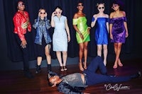 a group of women posing for a photo